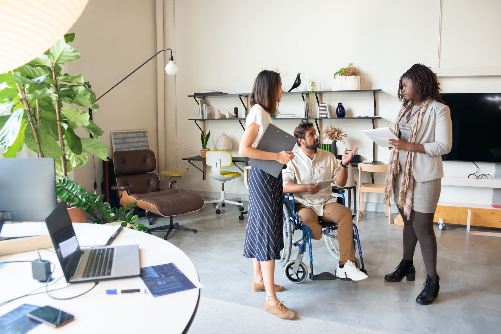 Professionals collaborating during a workplace learning discussion